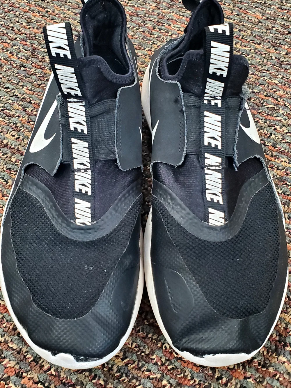 Nike Men’s Black and White Slip-On Athletic Sneakers